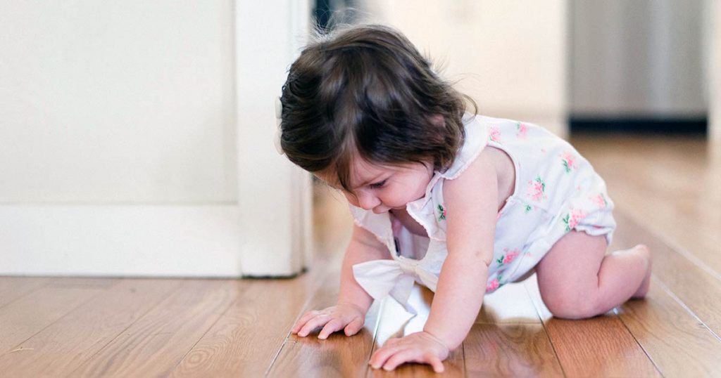 How to Help a Baby Stand on Their Own