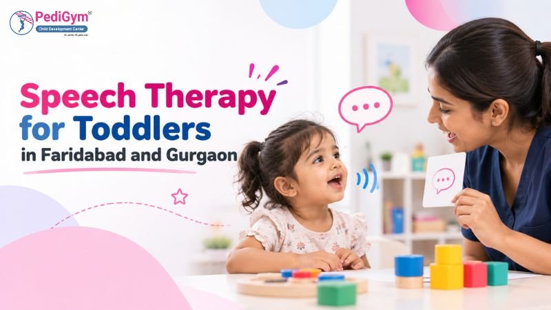 Smiling speech therapist showing a speech bubble flashcard to a toddler girl at a table with colorful blocks, with the text "Speech Therapy for Toddlers in Faridabad and Gurgaon