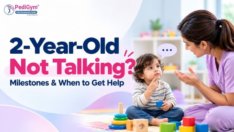 Mother or therapist gesturing gently toward a toddler sitting on a play mat with colorful blocks and a stacking toy, beside the title “2-Year-Old Not Talking? Milestones & When to Get Help”